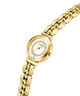 Gold GUESS Ladies Gold Tone Analog Watch with a white face on a white background lifestyle