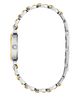 Silver and gold GUESS Ladies 2-Tone Analog Watch with a white background
