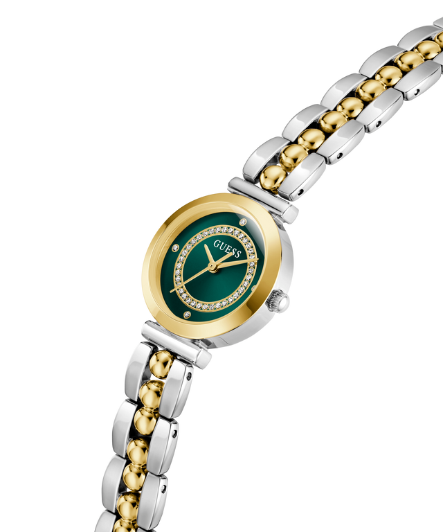 Two-tone GUESS Ladies 2-Tone Analog Watch with green dial and gold accents on a white background lifestyle