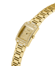 Gold watch with diamond-studded face on a white background lifestyle