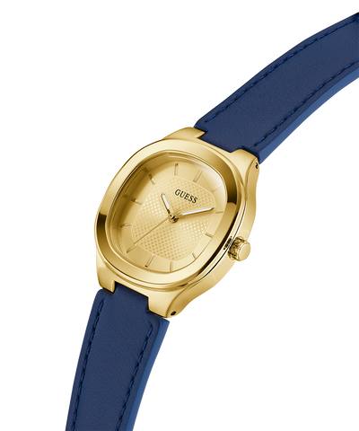 GUESS Ladies BLUE GOLD TONE Analog Watch with blue strap on a white background lifestyle
