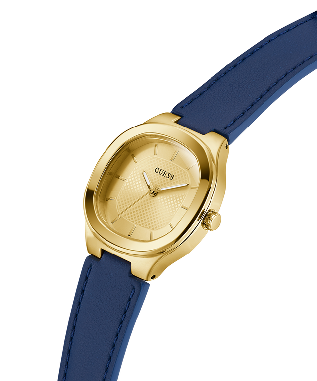 GUESS Ladies BLUE GOLD TONE Analog Watch with blue strap on a white background lifestyle