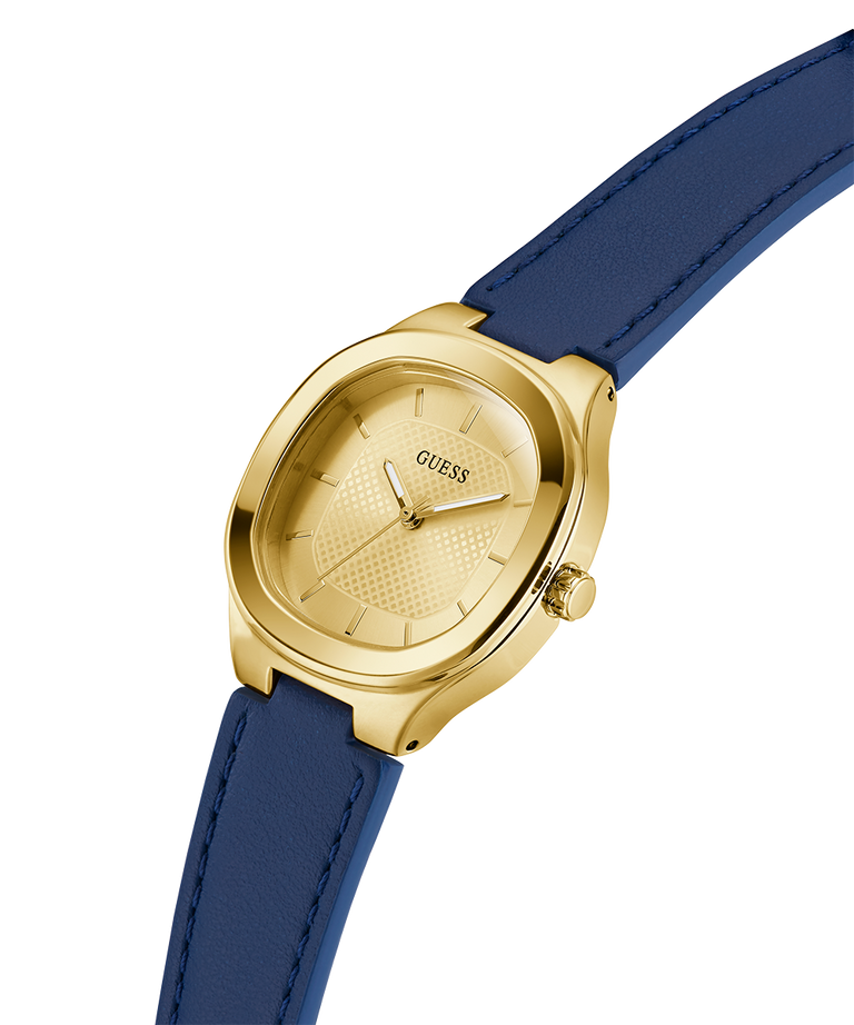 GUESS Ladies BLUE GOLD TONE Analog Watch with blue strap on a white background lifestyle