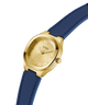 GUESS Ladies BLUE GOLD TONE Analog Watch with blue strap on a white background lifestyle