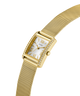 Gold GUESS Ladies Gold Tone Analog Watch with a mesh band on a white background lifestyle