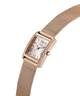 GUESS Ladies Rose Gold Tone Analog Watch with mesh band on a white background lifestyle