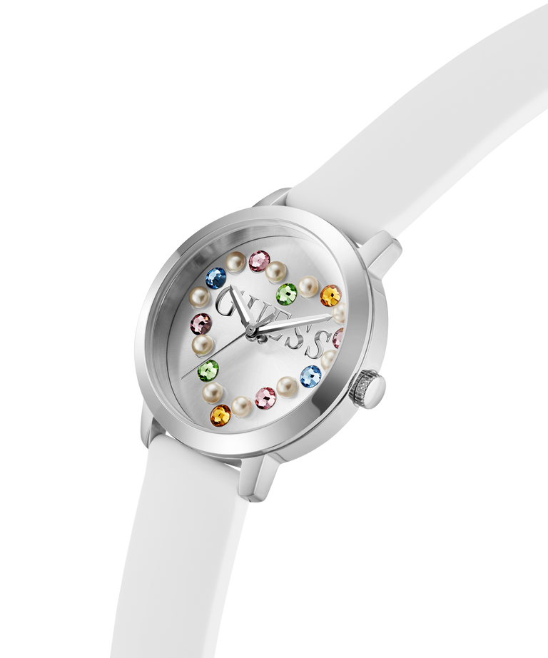 White GUESS Ladies White Silver Tone Analog Watch with colorful gemstones on a white background lifestyle