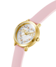 Watch with pink strap and gold case on a white background lifestyle