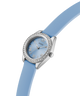 Blue watch with a silver bezel and crystal accents on a white background lifestyle