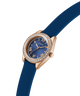GUESS Ladies Mini Luna Blue Rose Gold Tone Analog Watch with blue strap and rose gold case on white background lifestyle