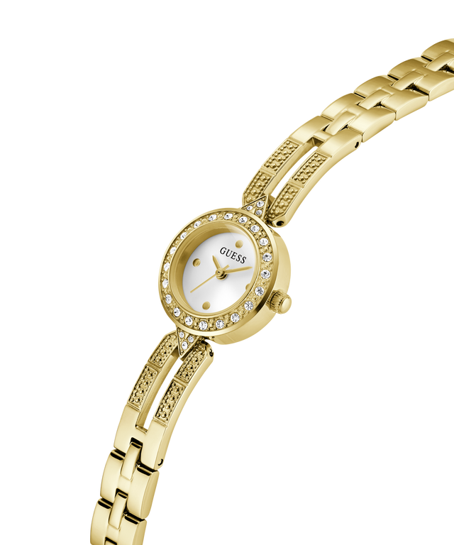 Gold watch with a white face on a white background lifestyle
