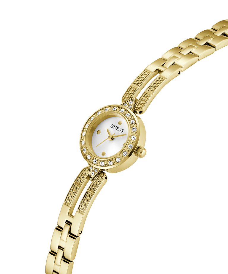 Gold watch with a white face on a white background lifestyle