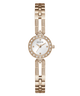 Rose gold GUESS Ladies Rose Gold Tone Analog Watch with a white face on a white background