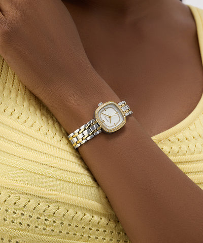 GUESS Ladies Hazel 2-Tone Analog Watch on a wrist with a yellow top