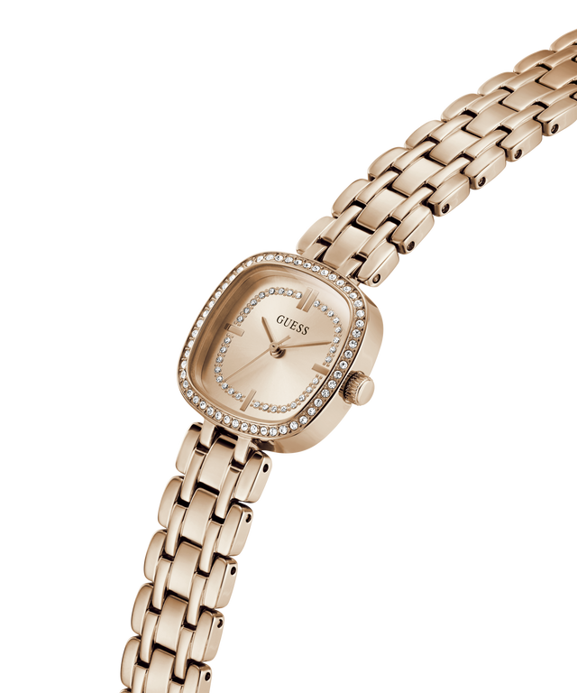Rose gold watch with diamond-studded face on a white background lifestyle