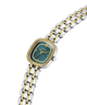GUESS Ladies Hazel 2-Tone Analog Watch with a green face on a white background lifestyle