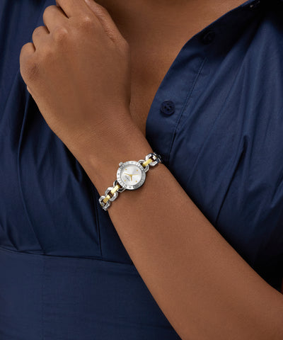Silver watch on a wrist with a dark blue shirt GW1019L3