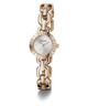 Rose gold chain-link GUESS Ladies Siren Rose Gold Tone Analog Watch with a white face on a white background