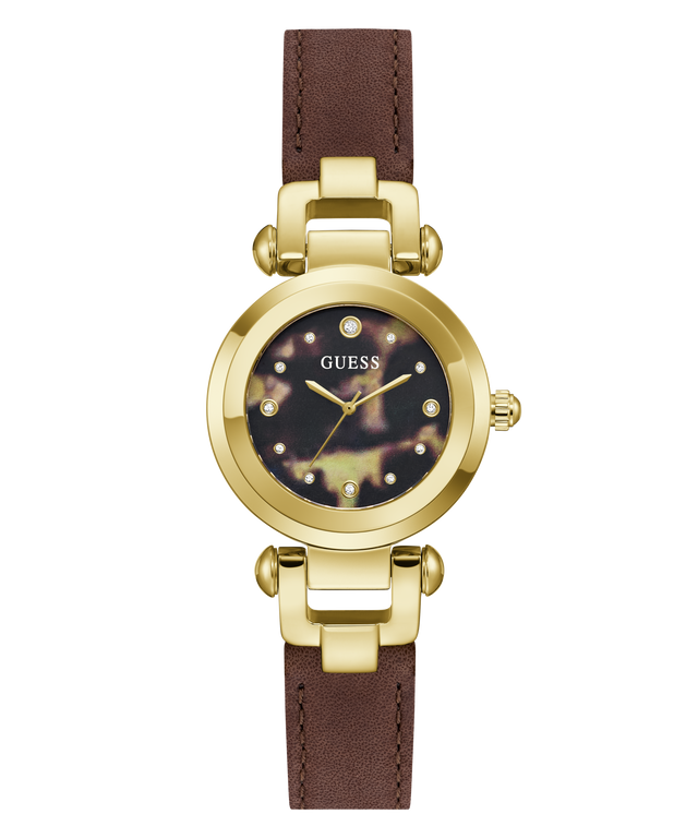 A women's wristwatch by Guess featuring a round gold-tone case, a dark mother-of-pearl dial with gold-tone hands and hour markers, and a brown leather strap with gold-tone hardware.