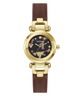 A women's wristwatch by Guess featuring a round gold-tone case, a dark mother-of-pearl dial with gold-tone hands and hour markers, and a brown leather strap with gold-tone hardware.