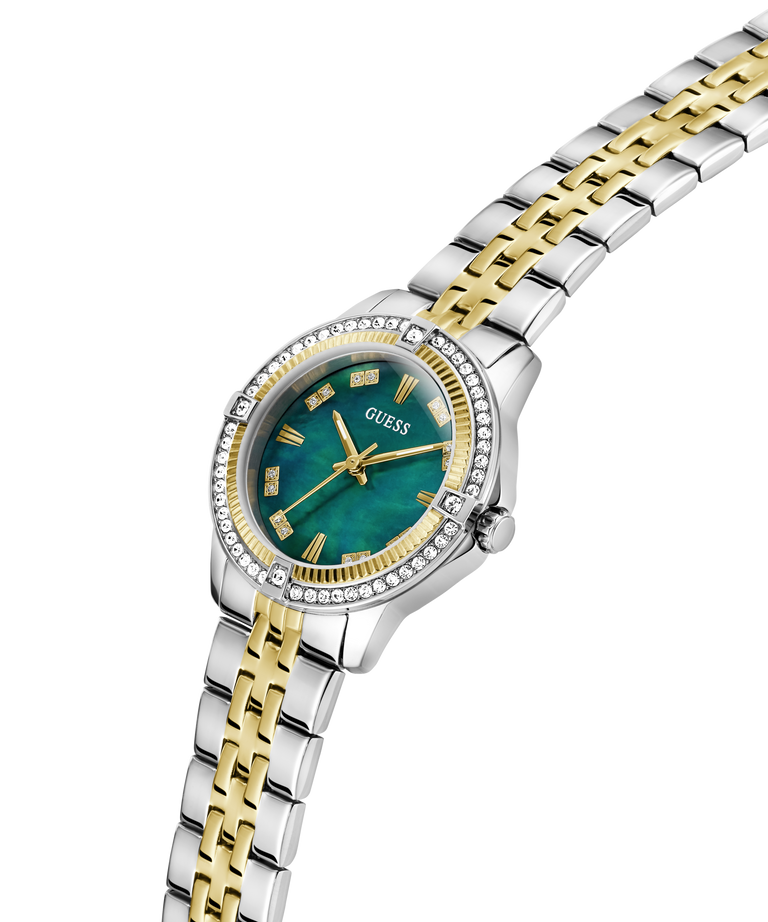 Two-tone watch with green face and gold accents on a white background lifestyle