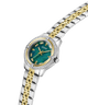 Two-tone watch with green face and gold accents on a white background lifestyle