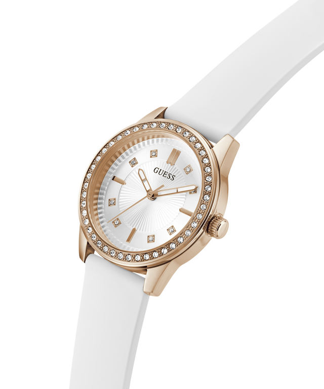 Guess watch with rose gold case and white strap on a transparent  lifestyle background