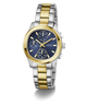 Two-toned GUESS Ladies Birdie 2-Tone Analog Watch with gold and silver band and blue dial on a white background