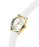 Gold watch with a white strap on a white background lifestyle