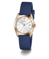 Guess watch with blue strap and rose gold case on a white background