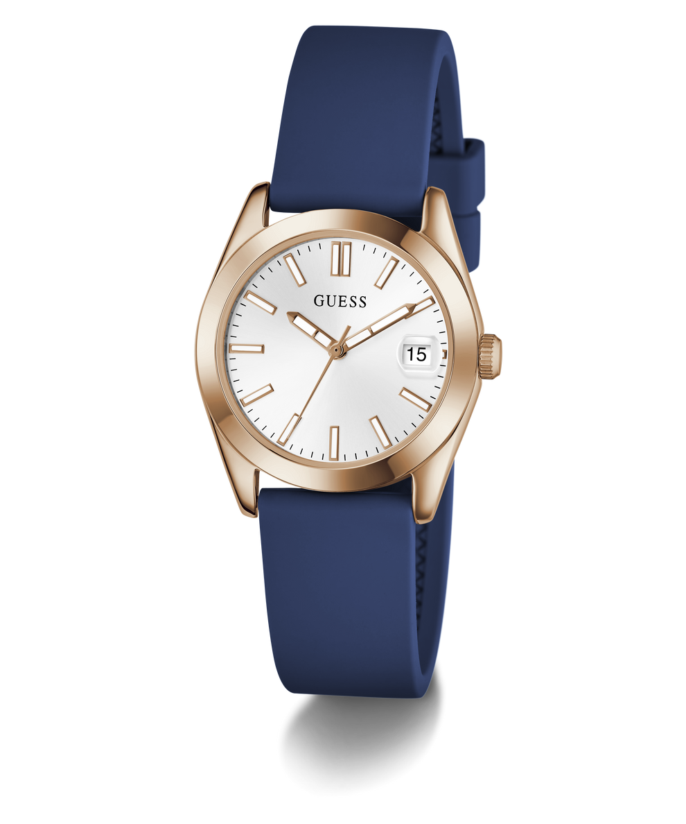 Guess watch with blue strap and rose gold case on a white background