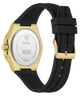 Back view of a Guess watch with black strap and gold case on a white background