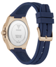 Watch with blue strap and rose gold case on a white background