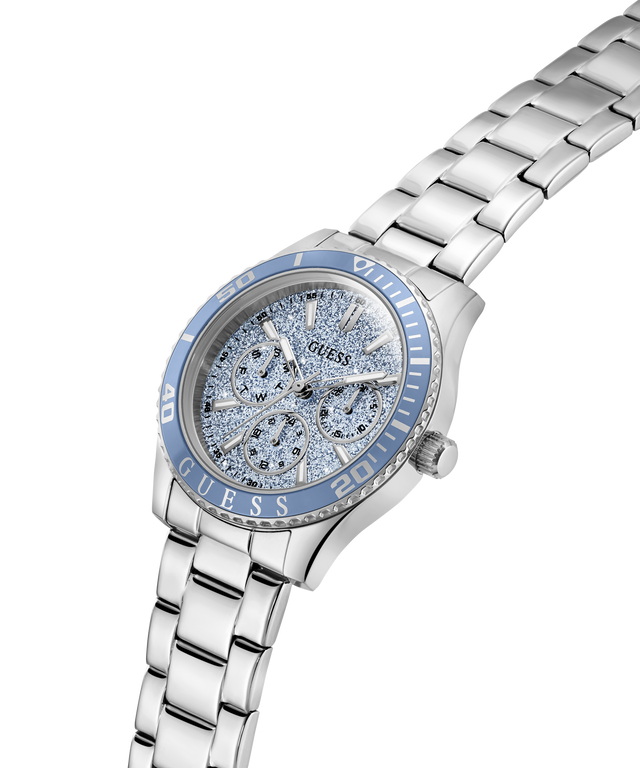 Silver Guess watch with blue face on a white background lifestyle