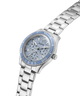 Silver Guess watch with blue face on a white background lifestyle