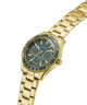 Gold watch with a blue face on a white background lifestyle