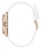Close-up of a GUESS Ladies White Rose Gold Tone Analog Watch with a white strap and rose gold case on a white background