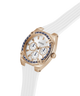 Gold GUESS Ladies White Rose Gold Tone Analog Watch with a white strap on a transparent background lifestyle
