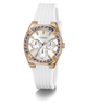 Guess watch with white strap and rose gold case on a white background