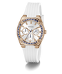 Guess watch with white strap and rose gold case on a white background