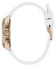 Close-up of a watch with a white strap and rose gold case on a white background