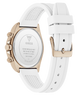 Guess watch with white strap and rose gold case on a white background
