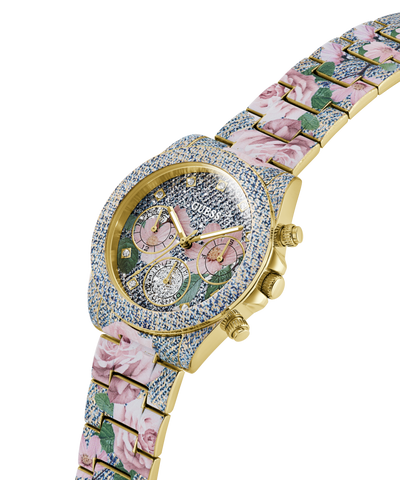 GUESS Ladies Blue Analog Watch with floral bracelet and gemstone embellishments on a white background lifestyle