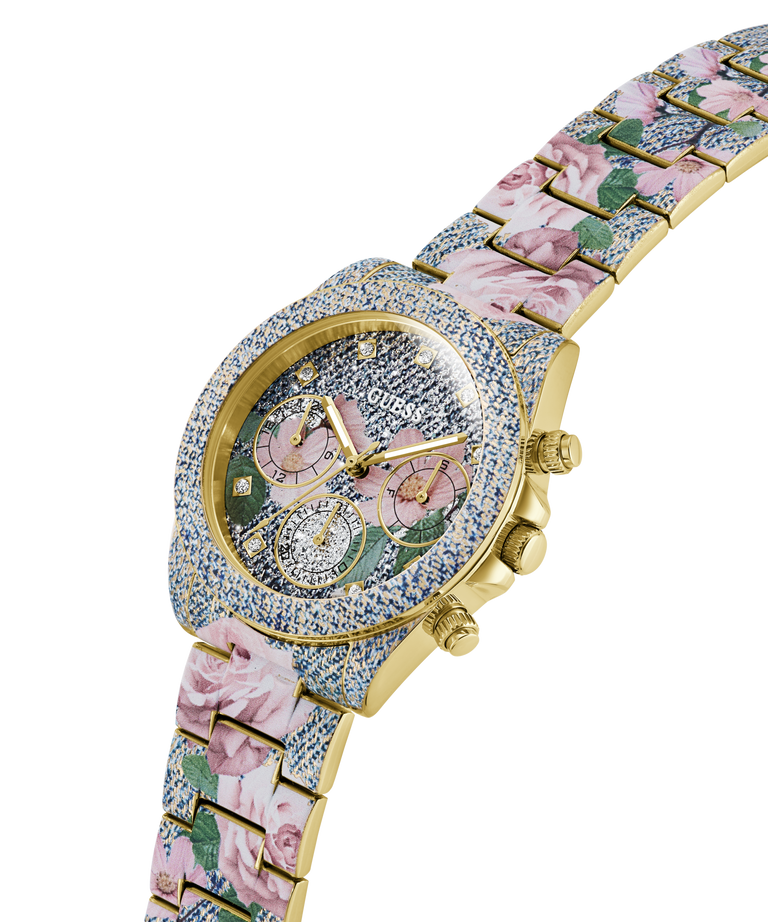GUESS Ladies Blue Analog Watch with floral bracelet and gemstone embellishments on a white background lifestyle