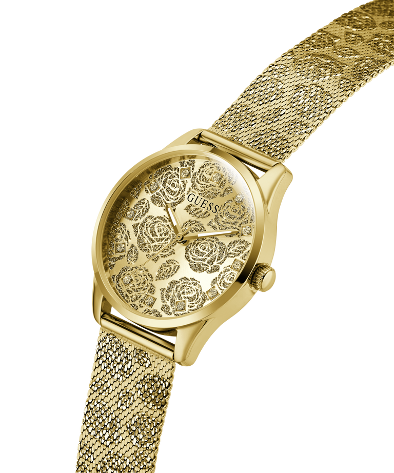 Gold watch with floral design on the face against a white background lifestyle