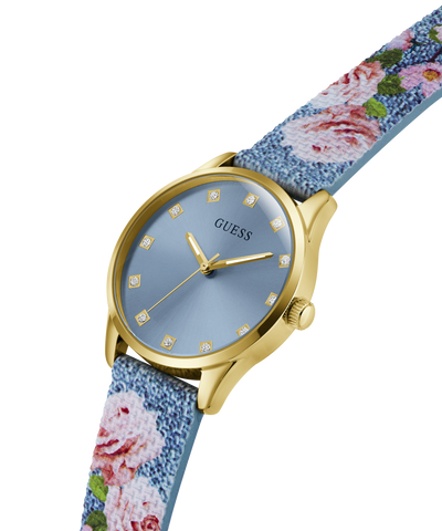 GUESS Ladies Blue Gold Tone Analog Watch with floral strap on a white background lifestyle