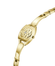 Gold wristwatch with intricate design on a white background lifestyle