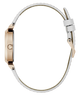 Watch with a white strap and rose gold case on a white background