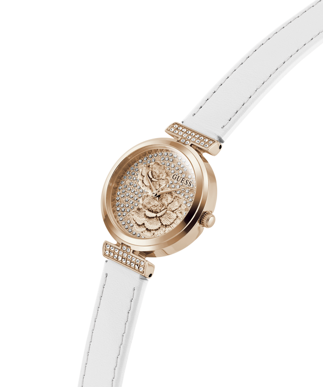 Rose gold watch with white strap on a white background lifestyle