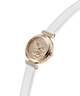 Rose gold watch with white strap on a white background lifestyle